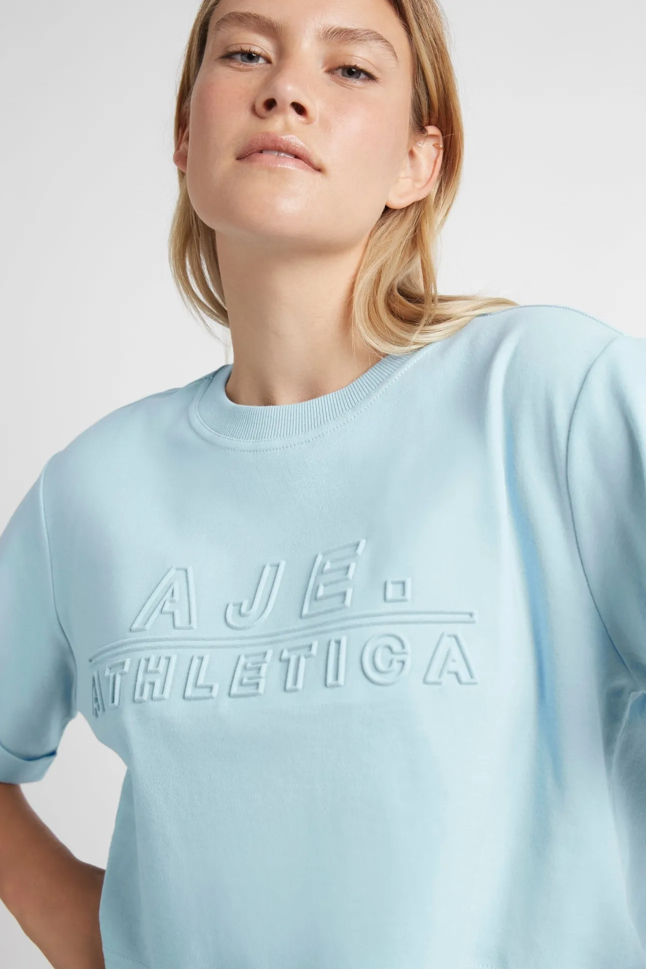 cropped_embossed_classic__8-1.webp Cropped Embossed Classic Logo T-Shirt 105