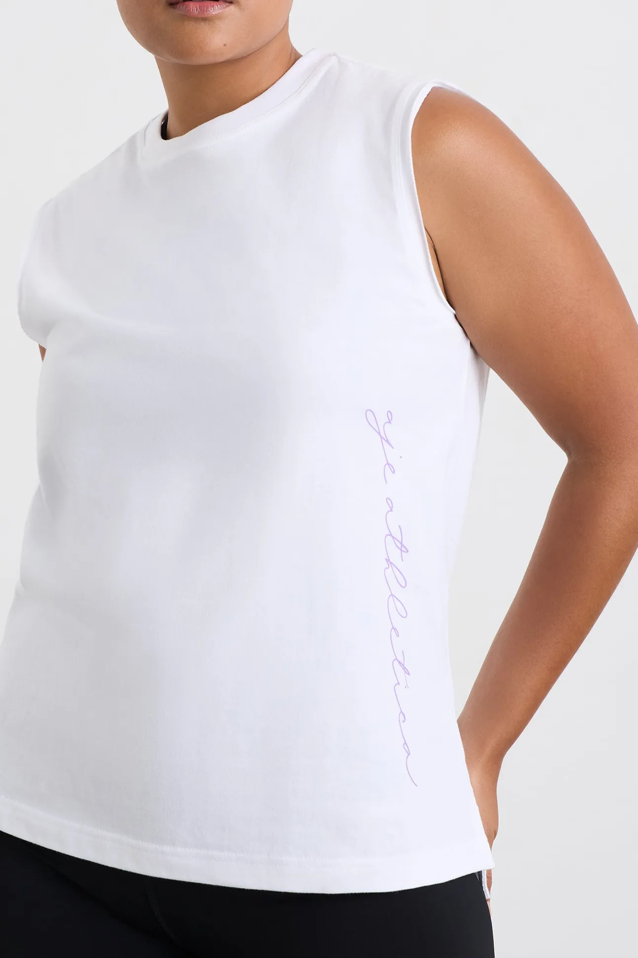 cursive_logo_longline_tan_4.webp Cursive Logo Longline Tank 101
