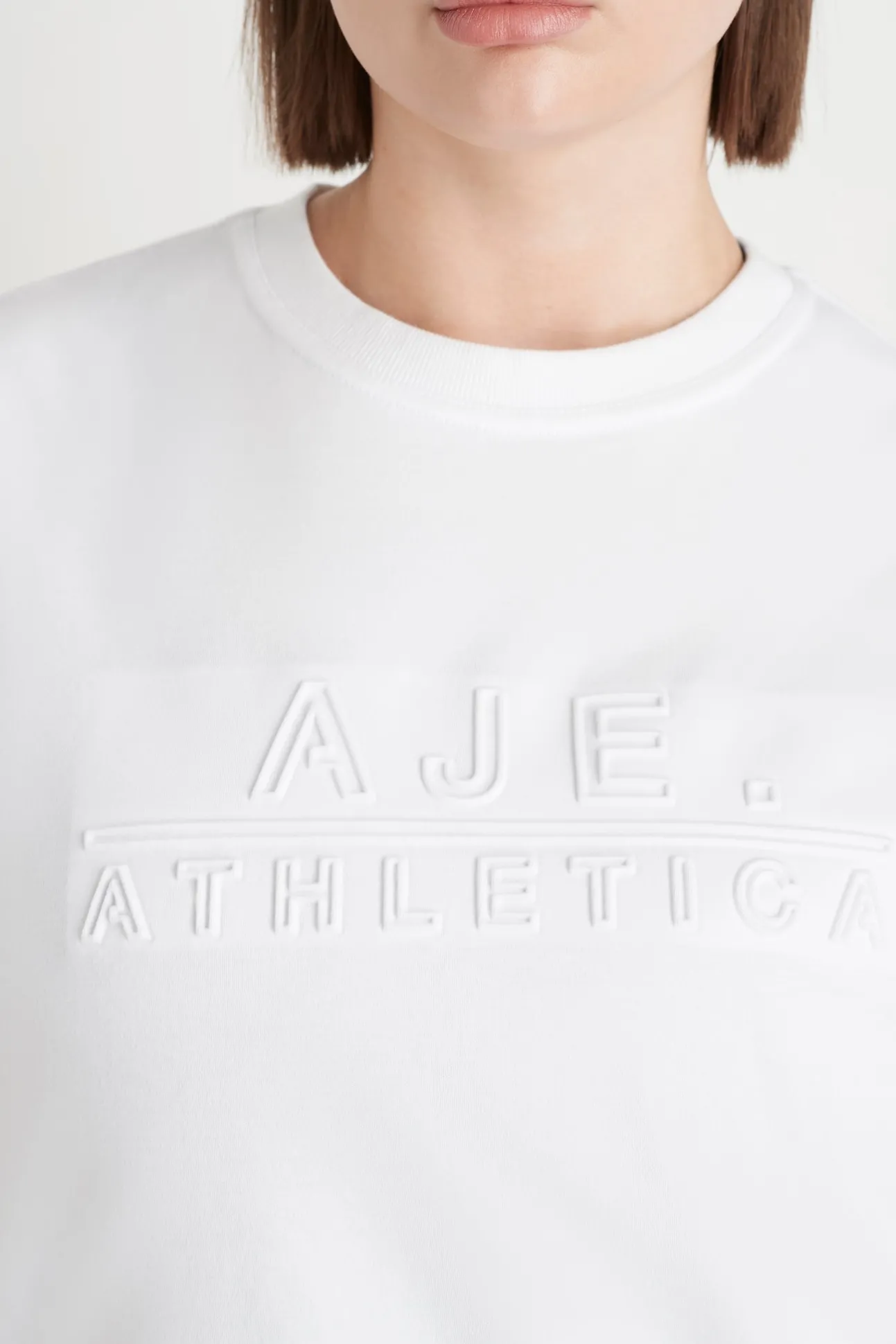 embossed_classic_logo_tan_11.webp Embossed Classic Logo Tank 101