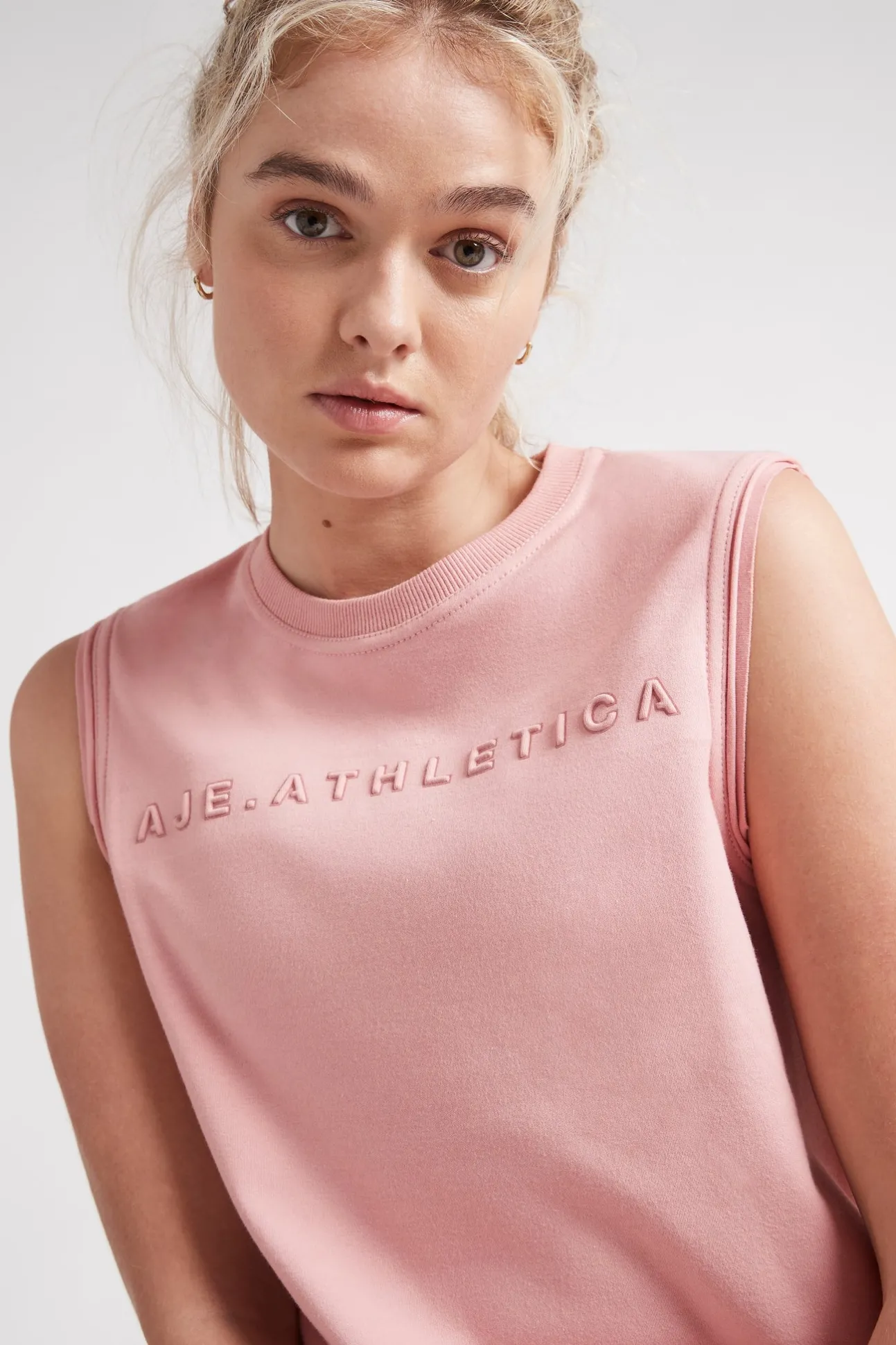 embossed_logo_tank__2.webp Embossed Logo Tank 101