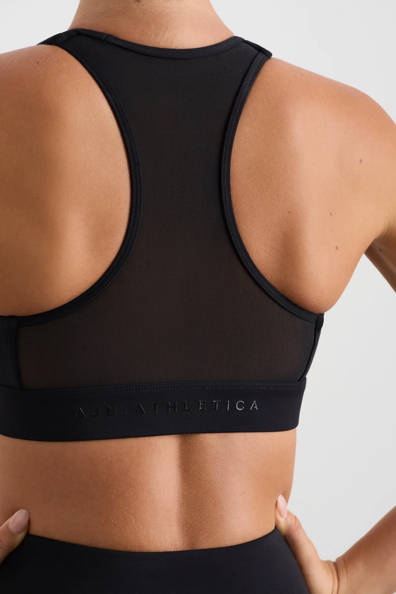 spliced_mesh_sports_bra__4.webp Spliced Mesh Sports Bra 370