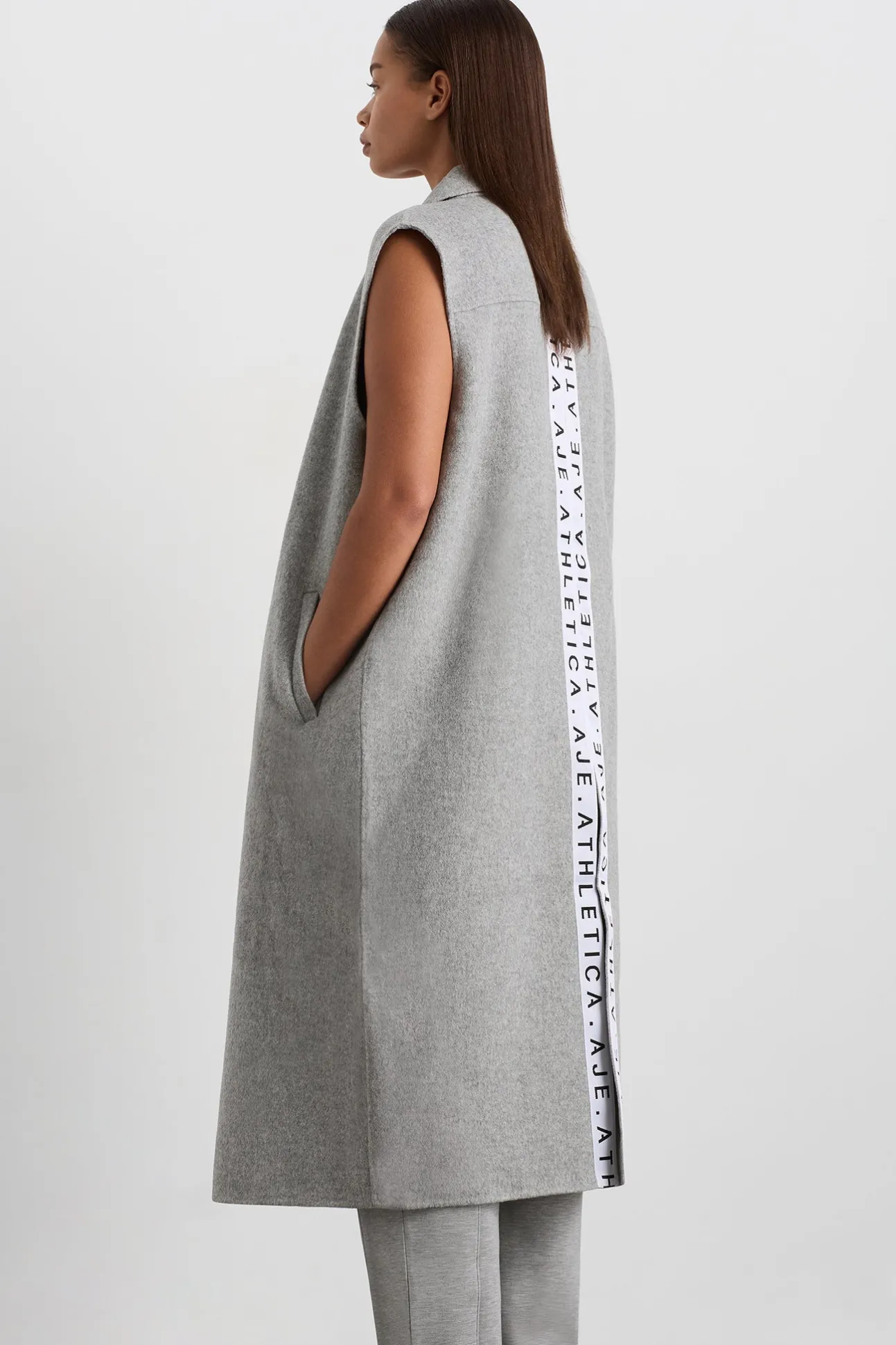 split_back_sleeveless_coa_7.webp Split Back Sleeveless Coat 760